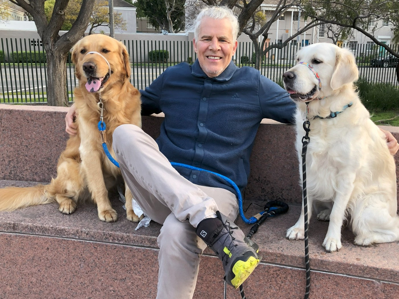 Charles with Gus and Harper, his two golden retrievers